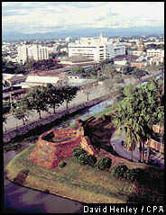 A view over the stone walls and moat which surround the ancient city of Chiang Mai